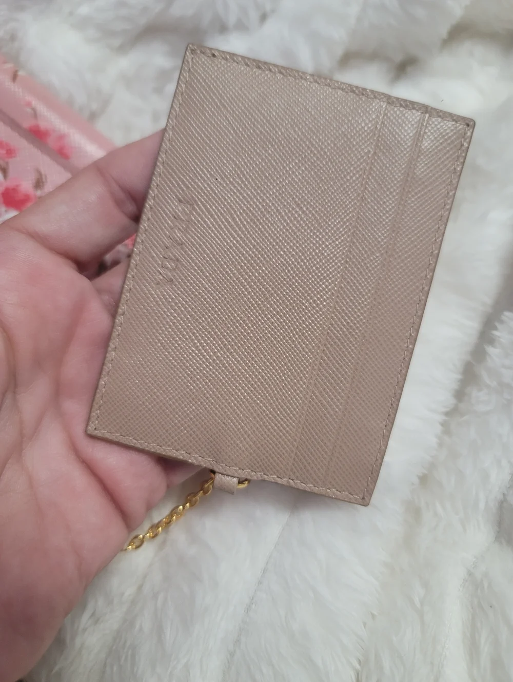 Prada Floral Continental Wallet made from pink Saffiano leather